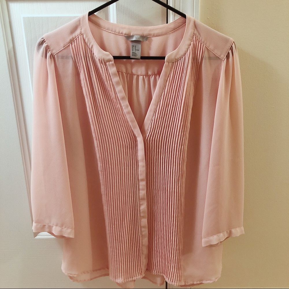 Pink pleated blouse